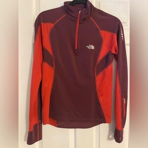 North Face Sz small a lightweight workout top with side zipper pocket on sleeve